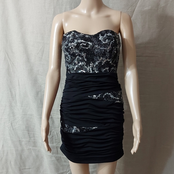 Nikibiki Dresses & Skirts - NIKIBIKI dress straples size Large color Black and silver